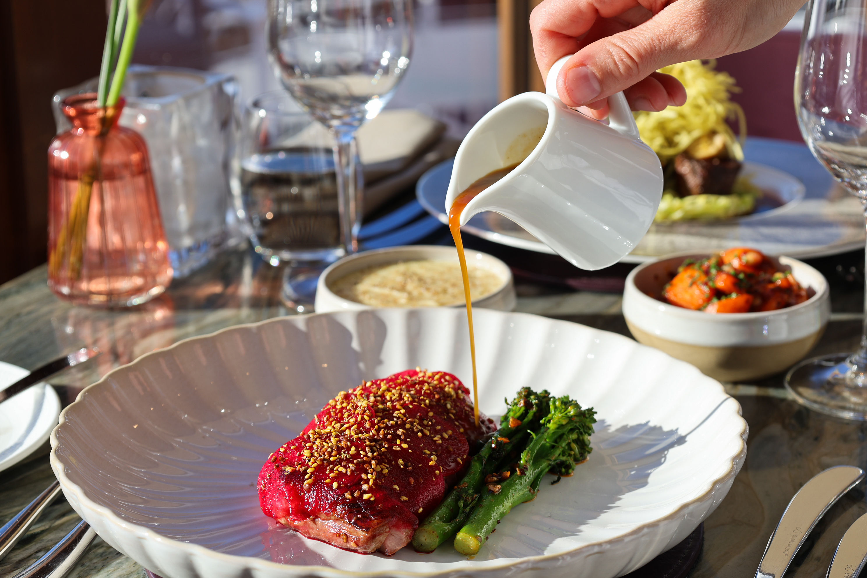Roasted Devon duck breast, sweet marinated mooli, broccolini, sauce bigarade 