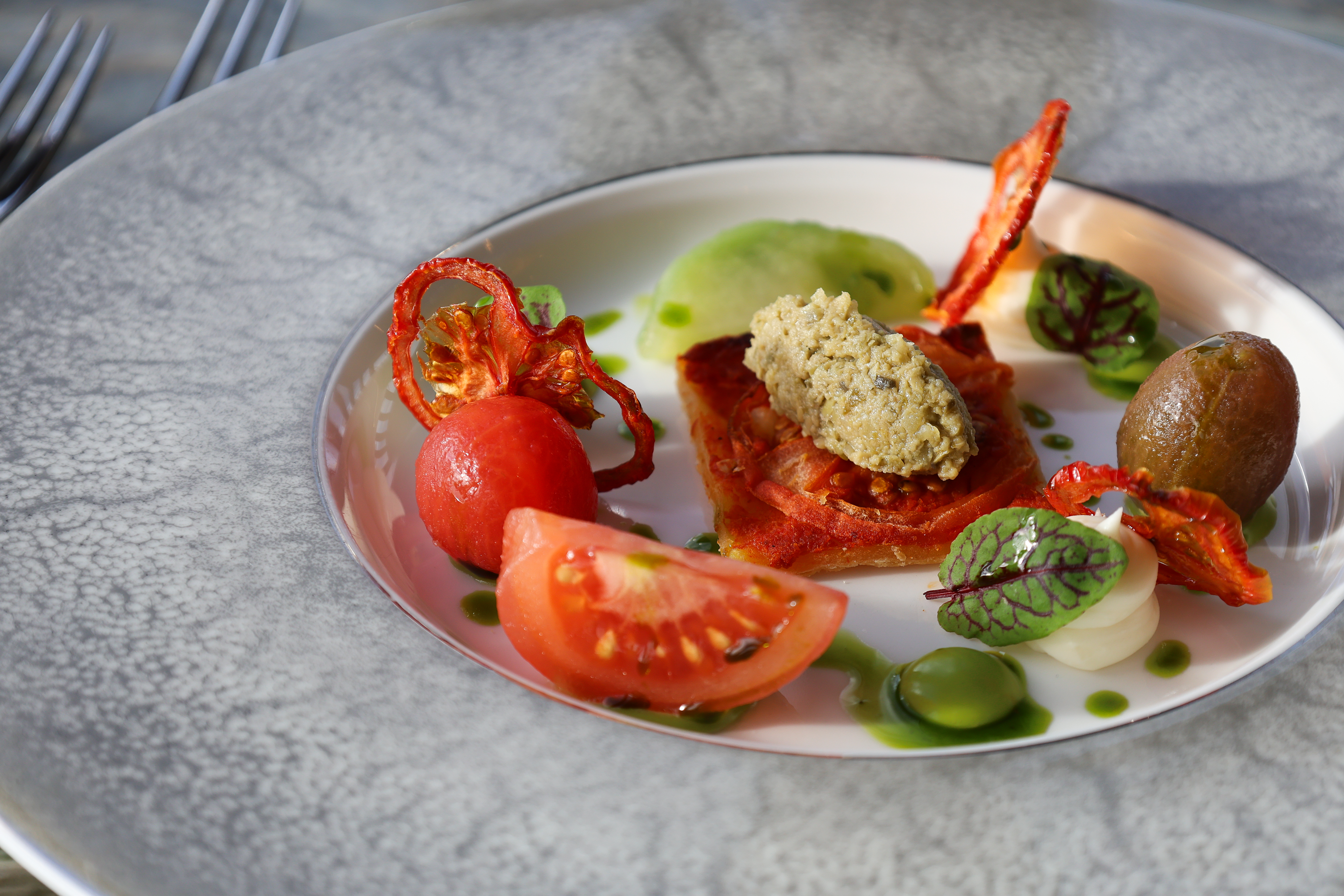 Isle of Wight tomato tart fine, goat’s curd &   gordal olives