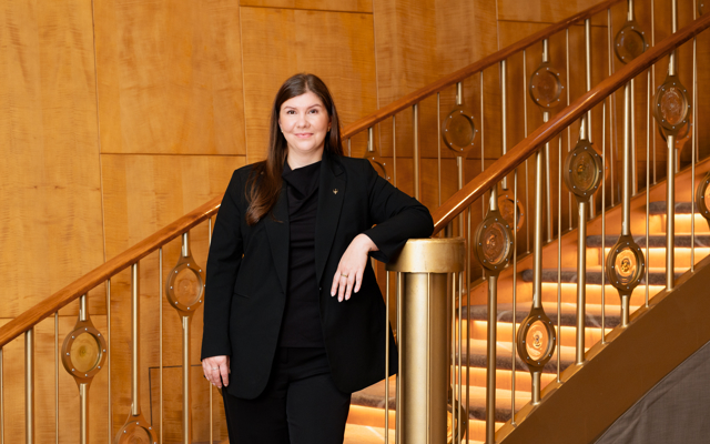 Woman standing on a staircase for a portrait