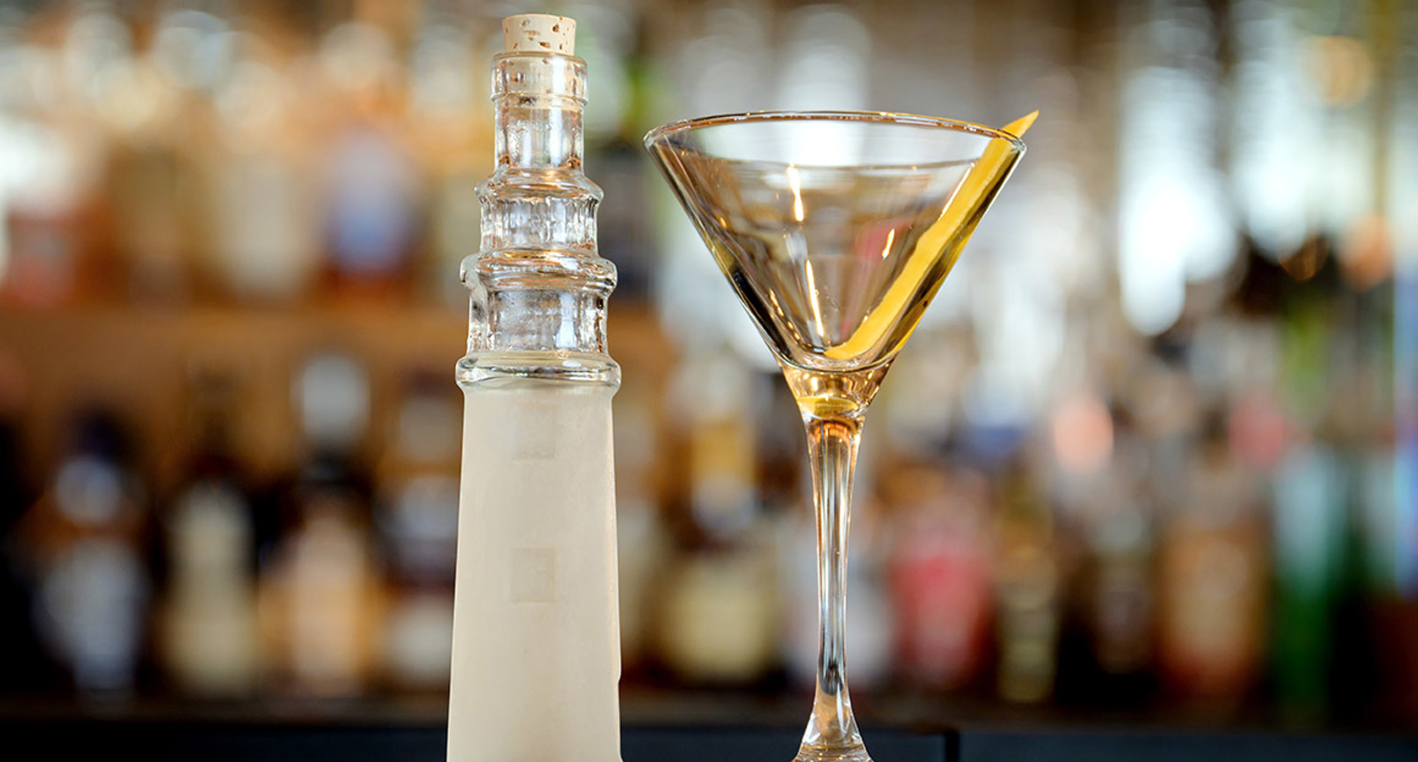 A martini glass and lighthouse-shaped bottle at The Lighthouse Restaurant. 