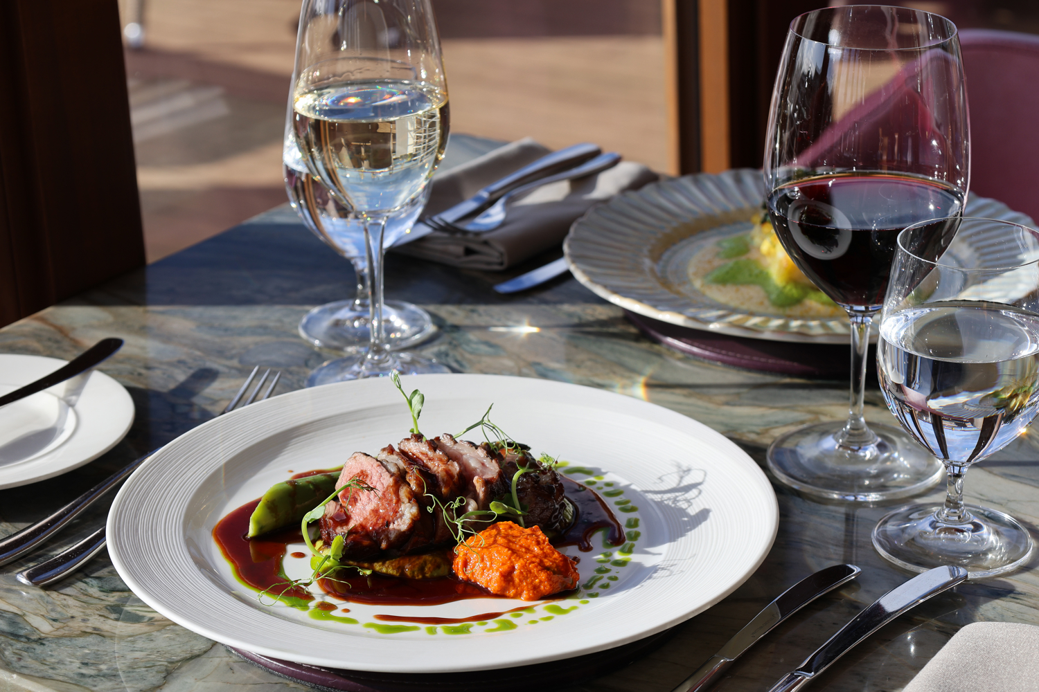 Tweed Valley lamb rump, courgette & basil purée,  romesco, asparagus & lamb jus