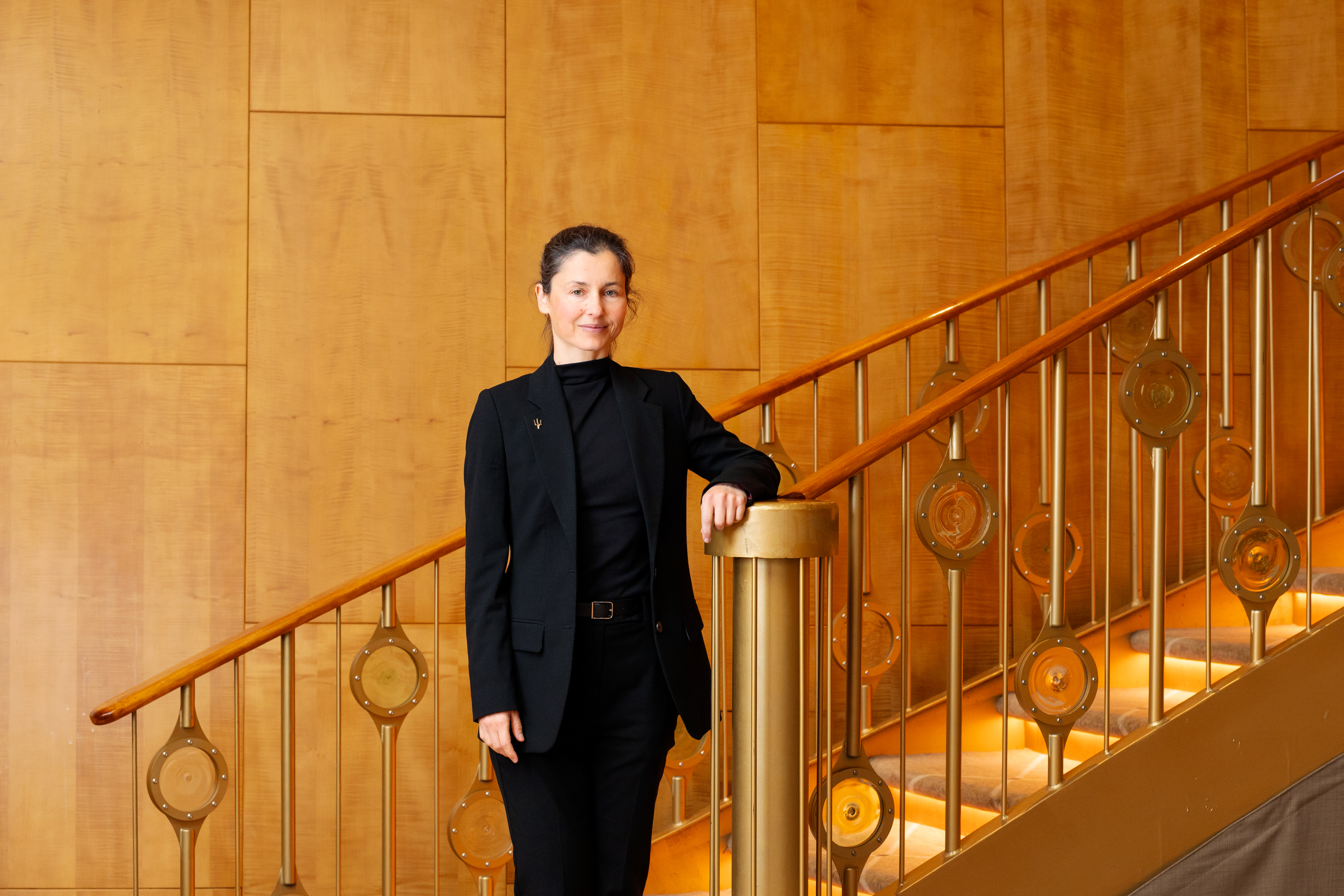 Woman standing on a staircase for a portrait