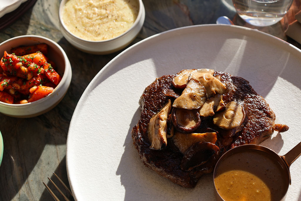 Miso-glazed Scottish 10oz ribeye steak, shiitake mushrooms, Fingal fries, peppercorn sauce